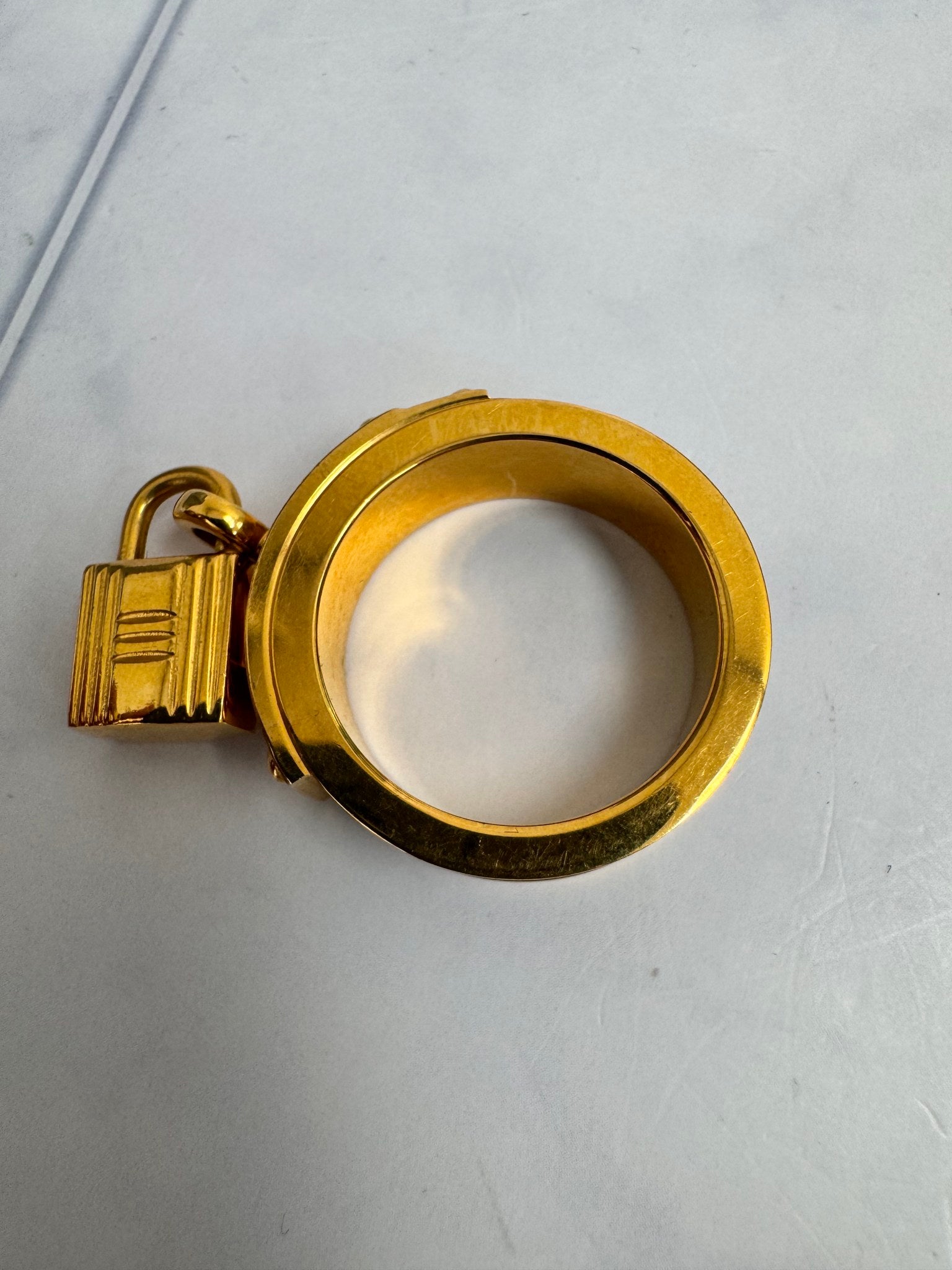 Hermes Gold Tone And Black Kelly Lock Scarf Ring