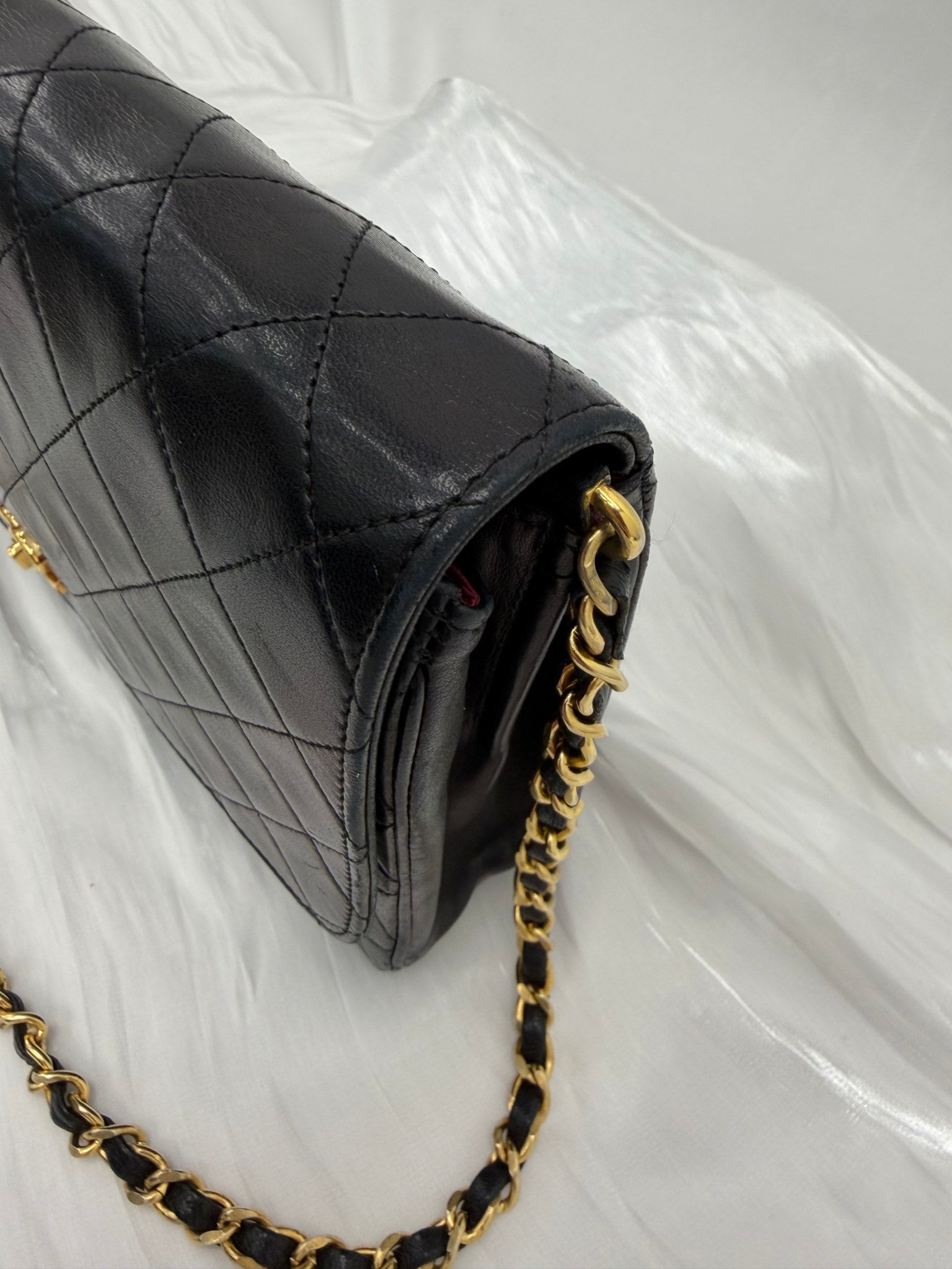 Chanel Vintage Black Quilted Leather 24K Flap Bag