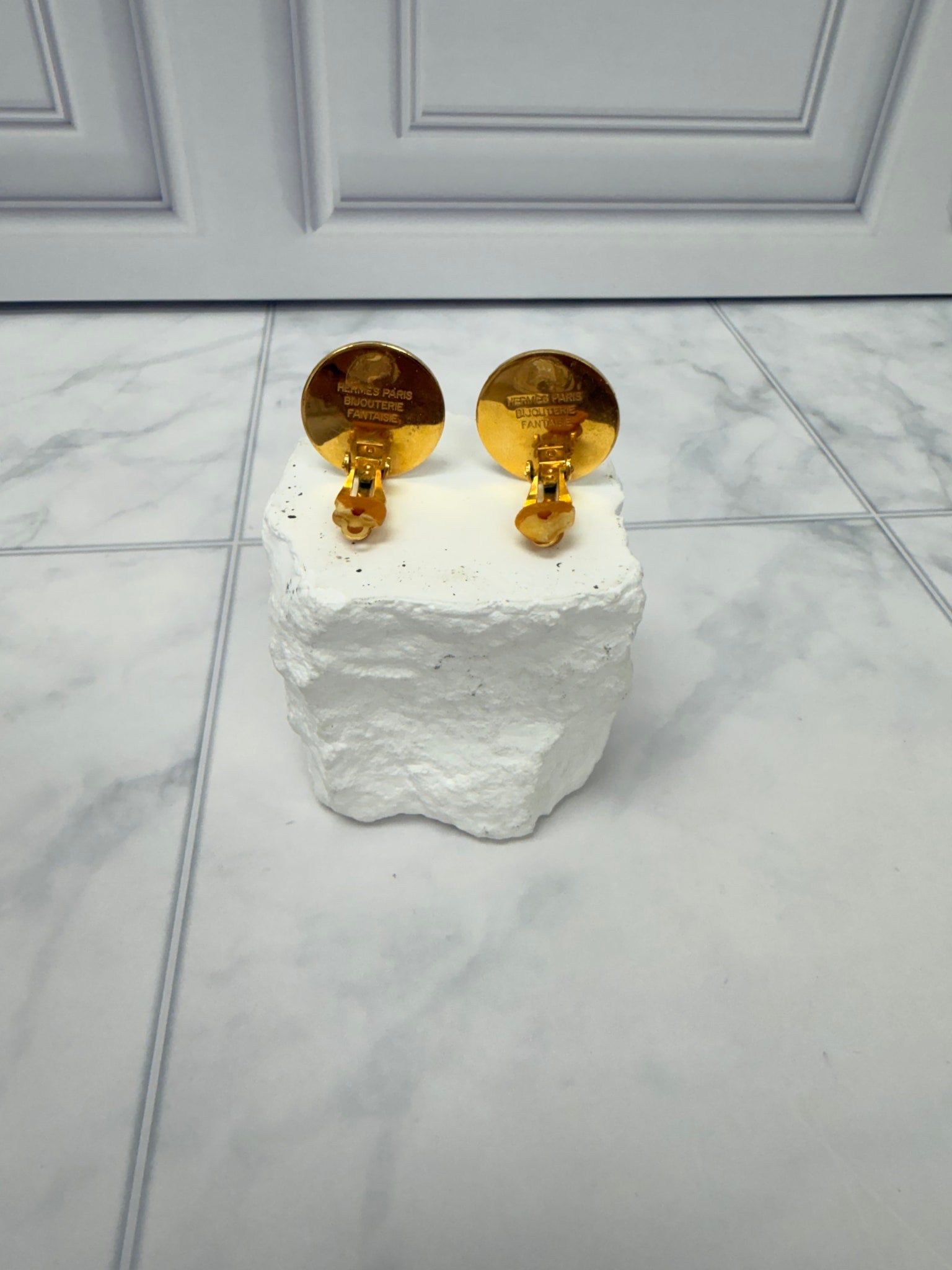 Hermes Gold Tone Coin Clip On Earrings