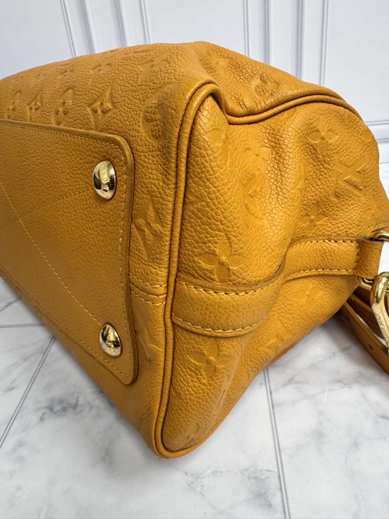 Louis Vuitton Safran Yellow Monogram Empreinte Speedy Bandouliere 25