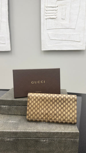 Gucci Gold Micro Guccissima Leather Flap Wallet