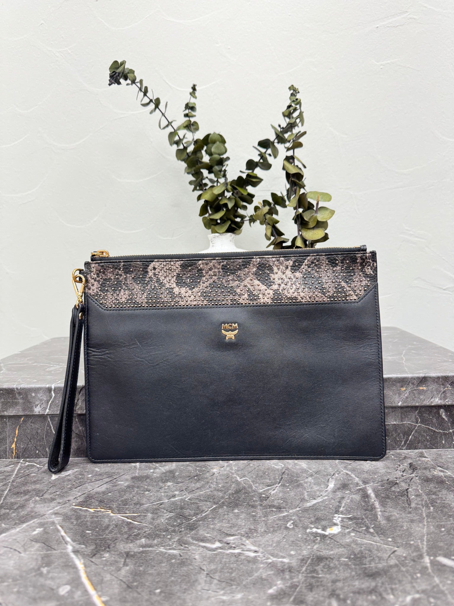 MCM Black Studded Snakeskin Clutch