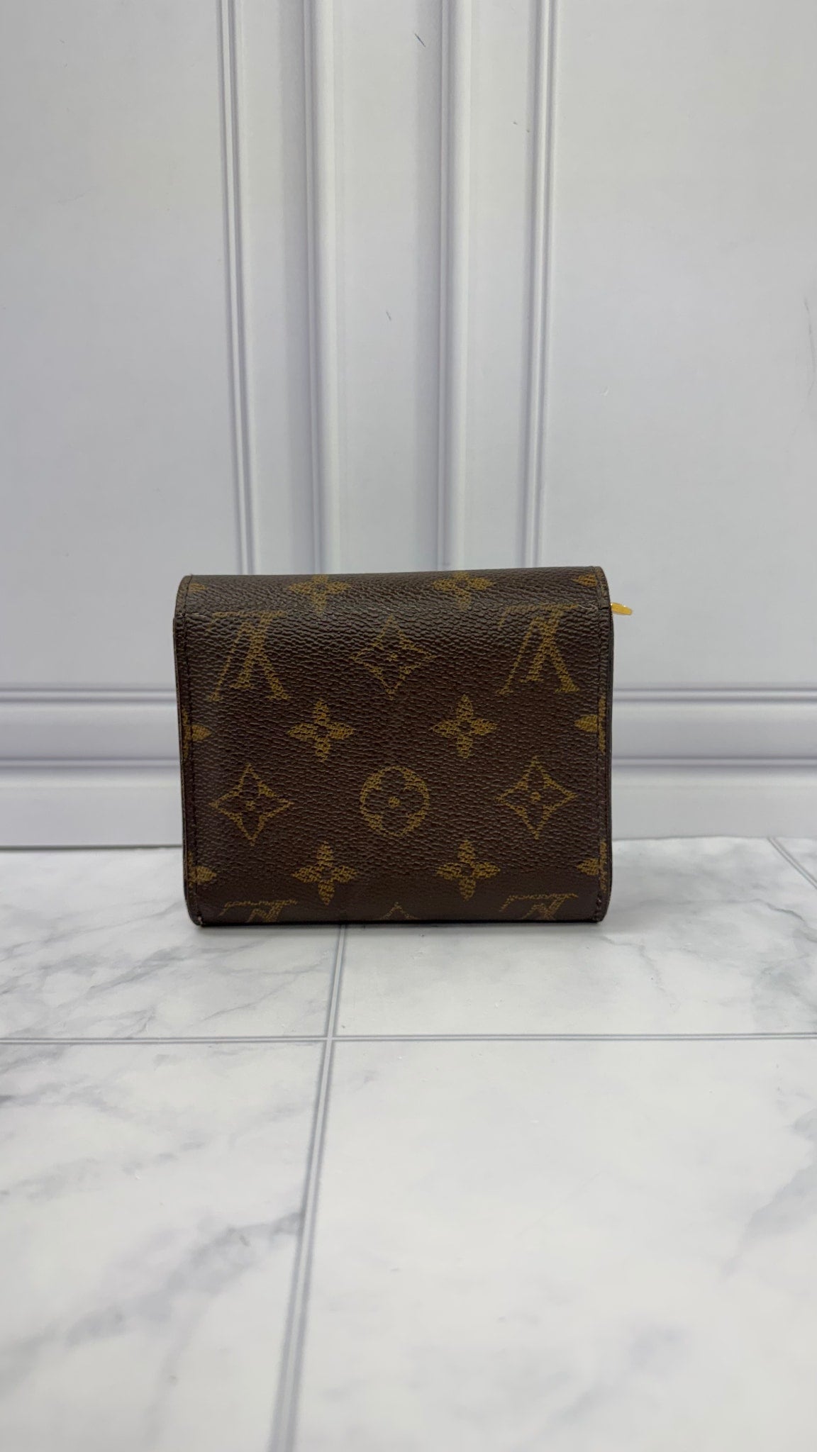 Louis Vuitton Monogram Ariane Trifold Wallet 