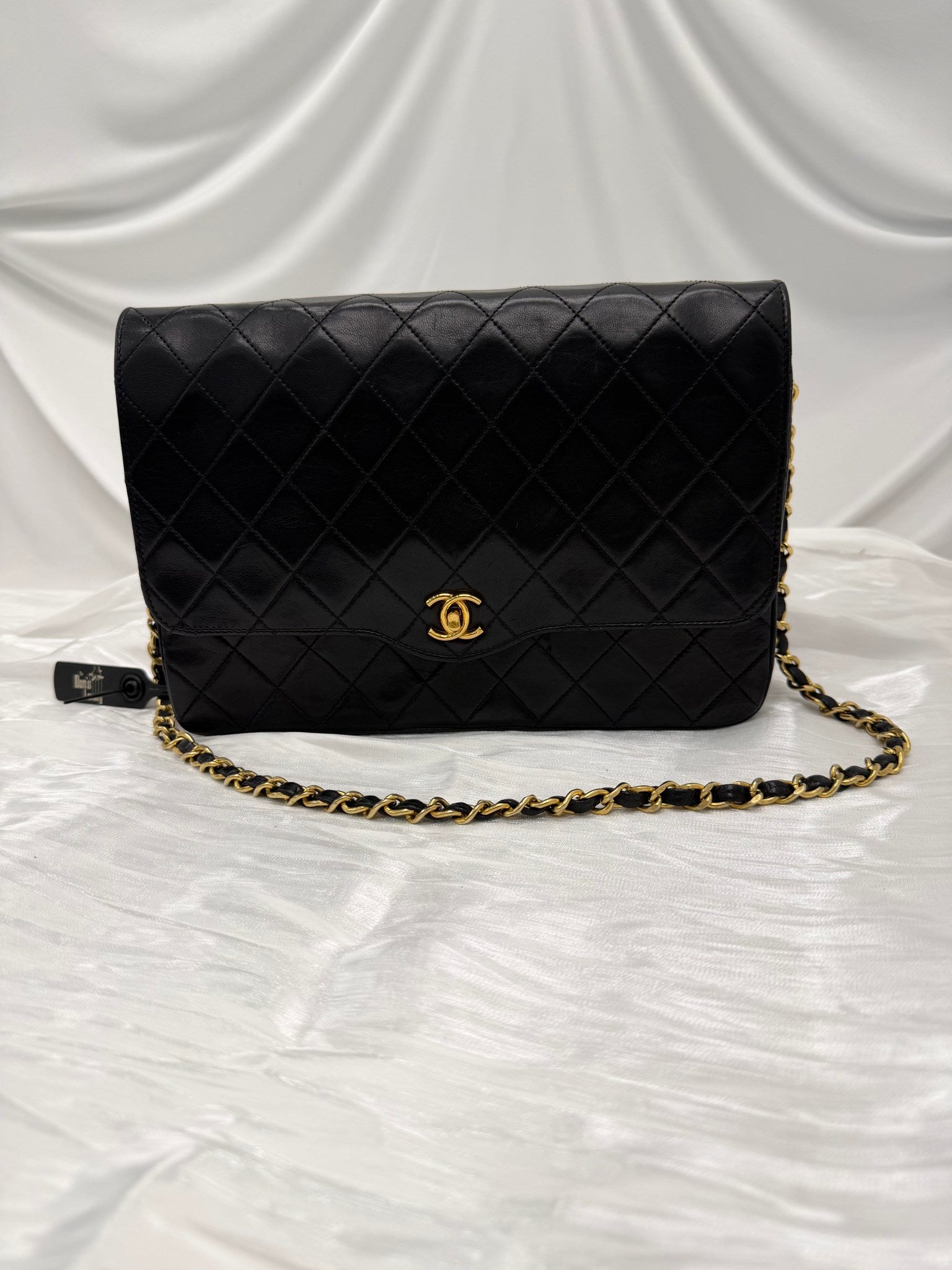 Chanel Vintage Black Quilted Leather 24K Flap Bag