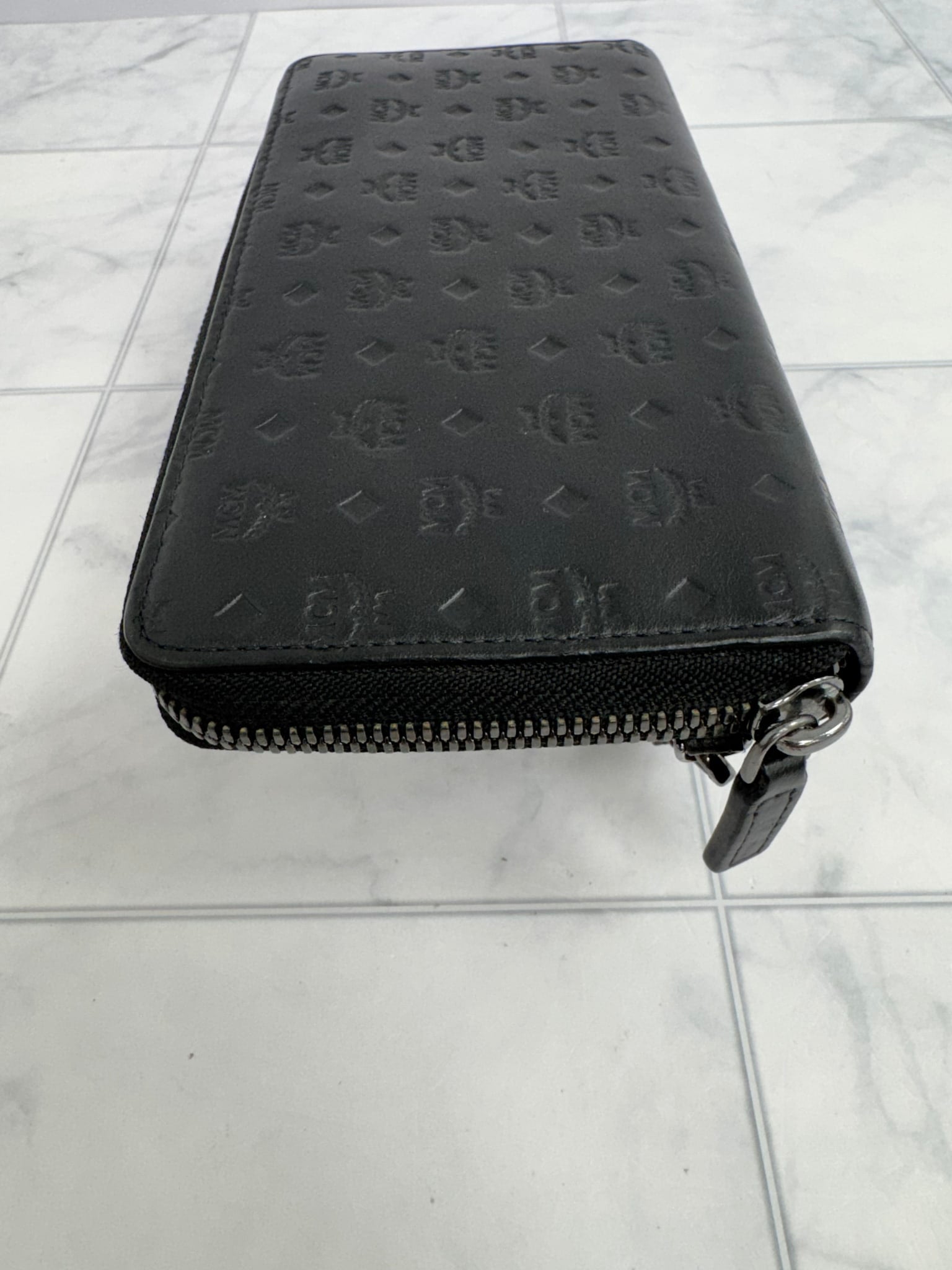 MCM Black Visetos Embossed Leather Zippy Wallet