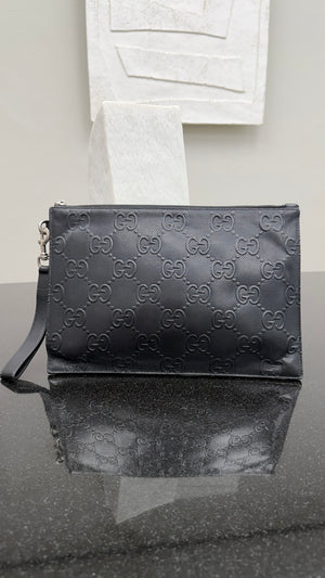 Gucci GG Embossed Perforated Leather Wristlet