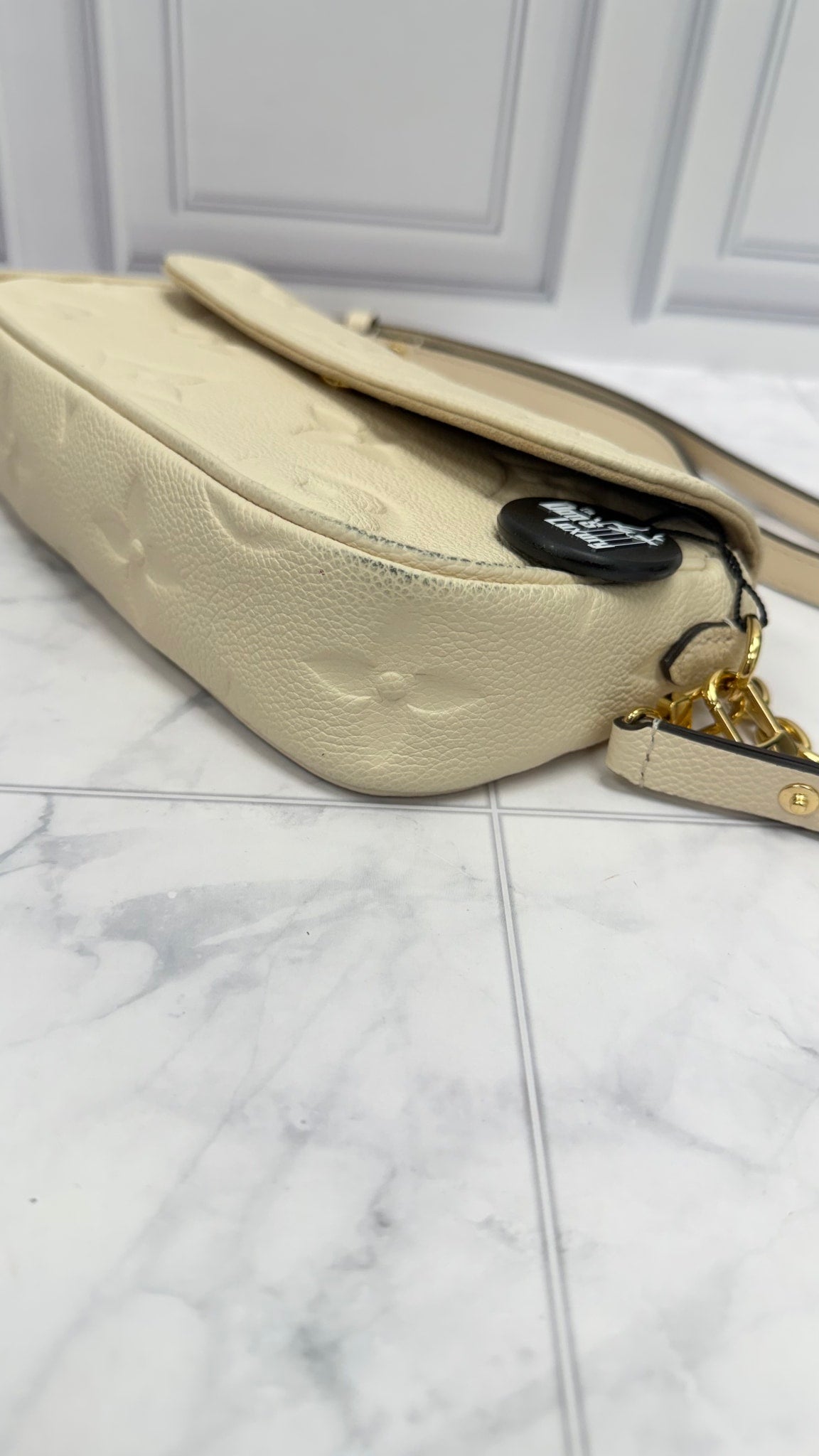Louis Vuitton Cream Empreinte Ivy Wallet on a Chain