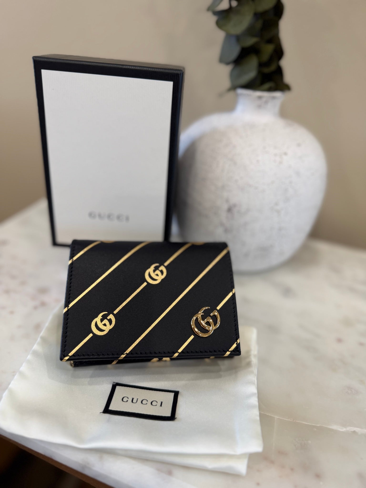 BRAND NEW- Gucci Black & Gold Diagonal GG Calfskin Compact Wallet