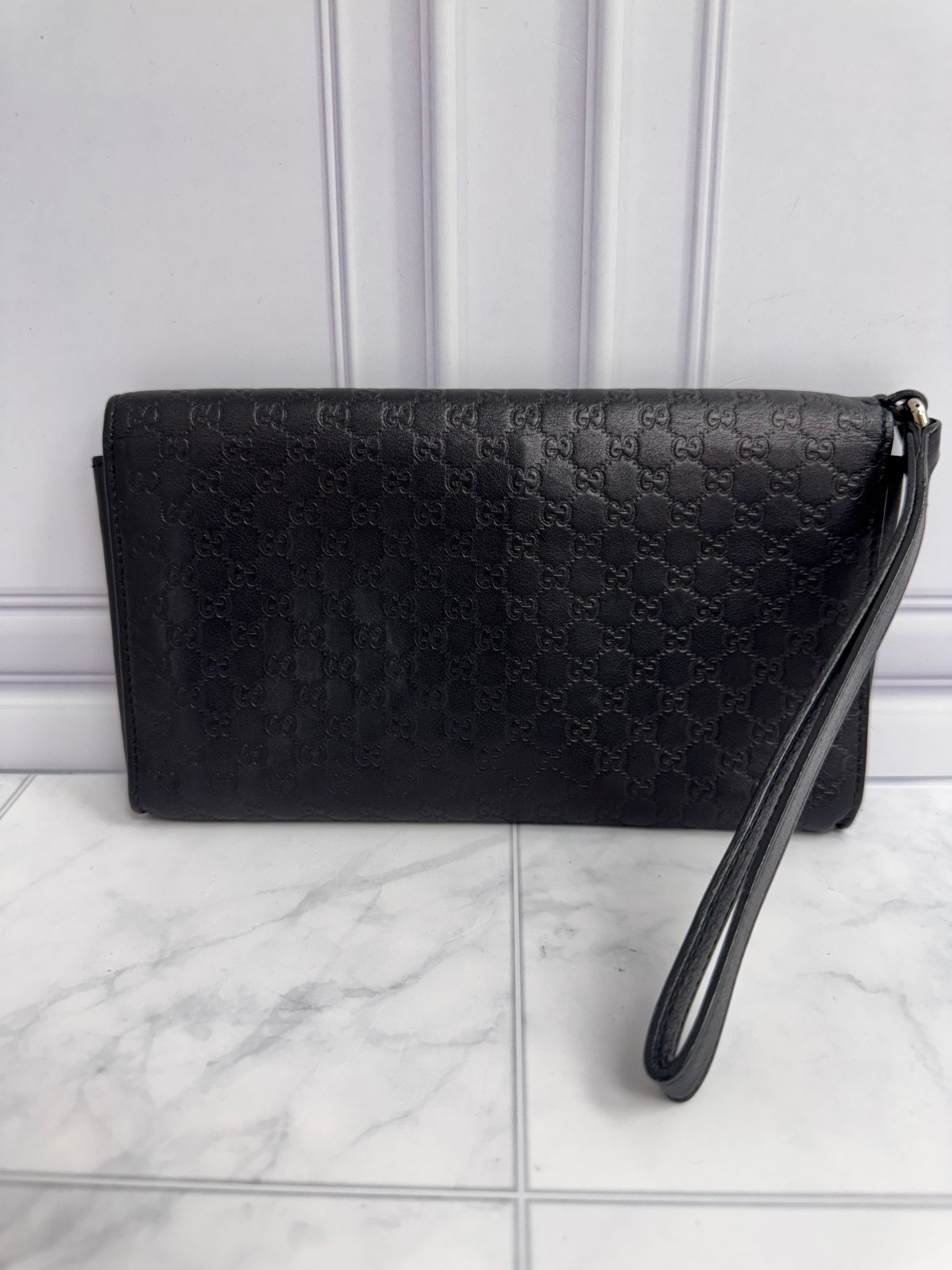 Gucci Black Microguccissima Embossed Leather Wristlet