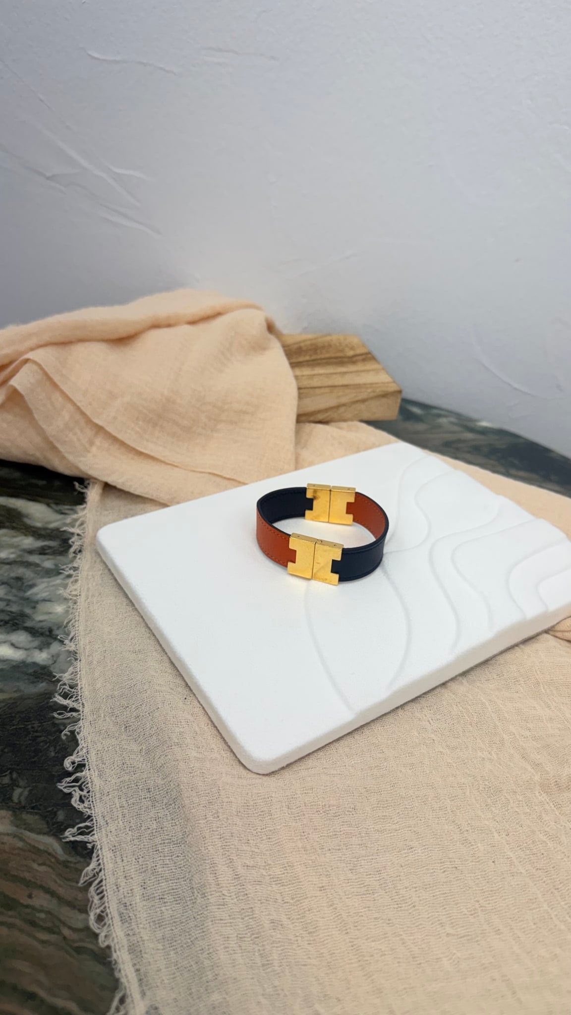 Hermes Black And Orange Leather Lurie Reversible Bracelet