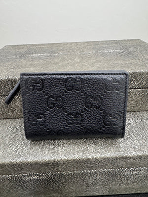 Gucci Black GG Embossed Leather Compact Wallet