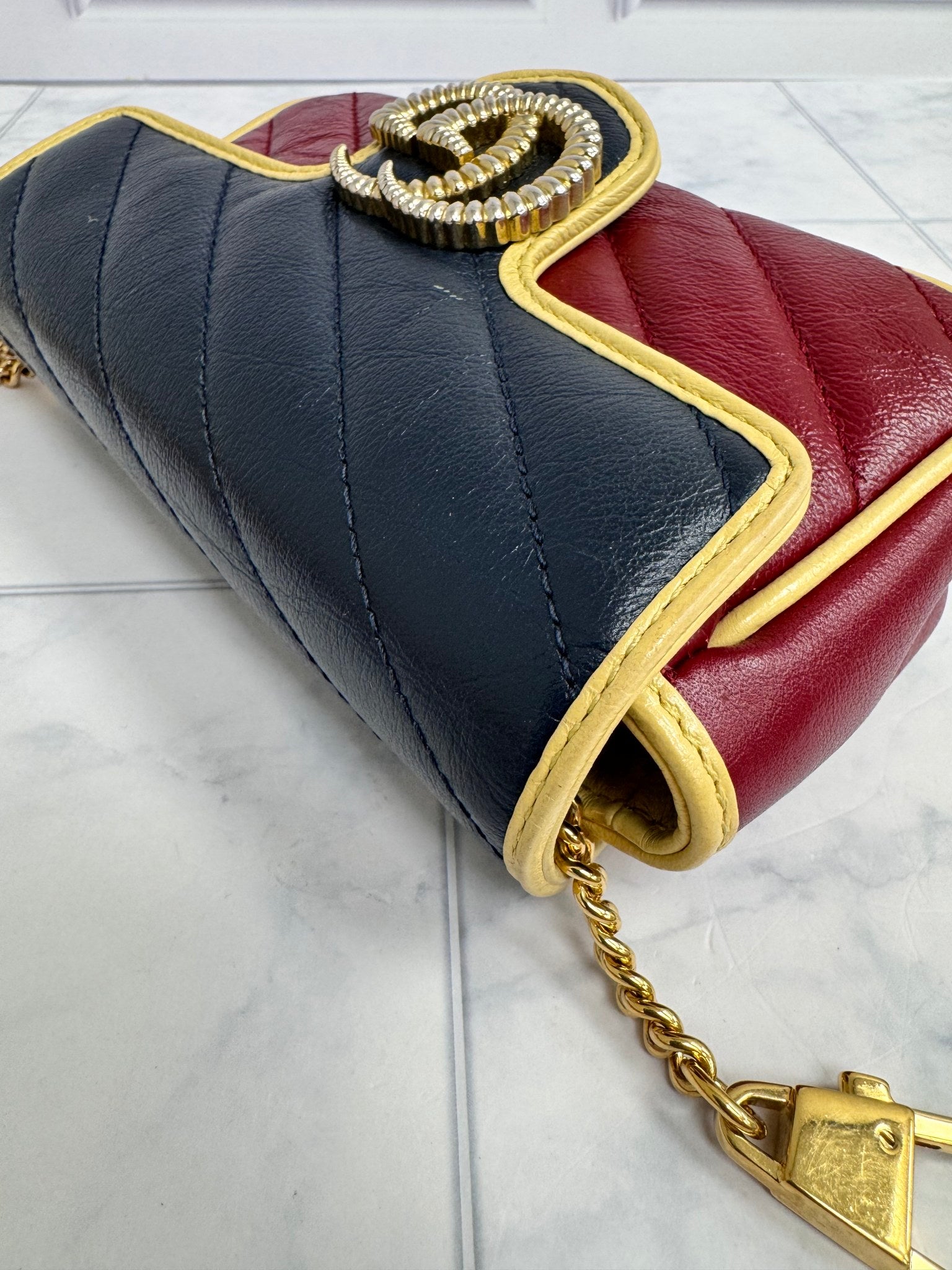 Gucci Red And Navy Quilted GG Marmont Torchon Super Mini Crossbody Bag
