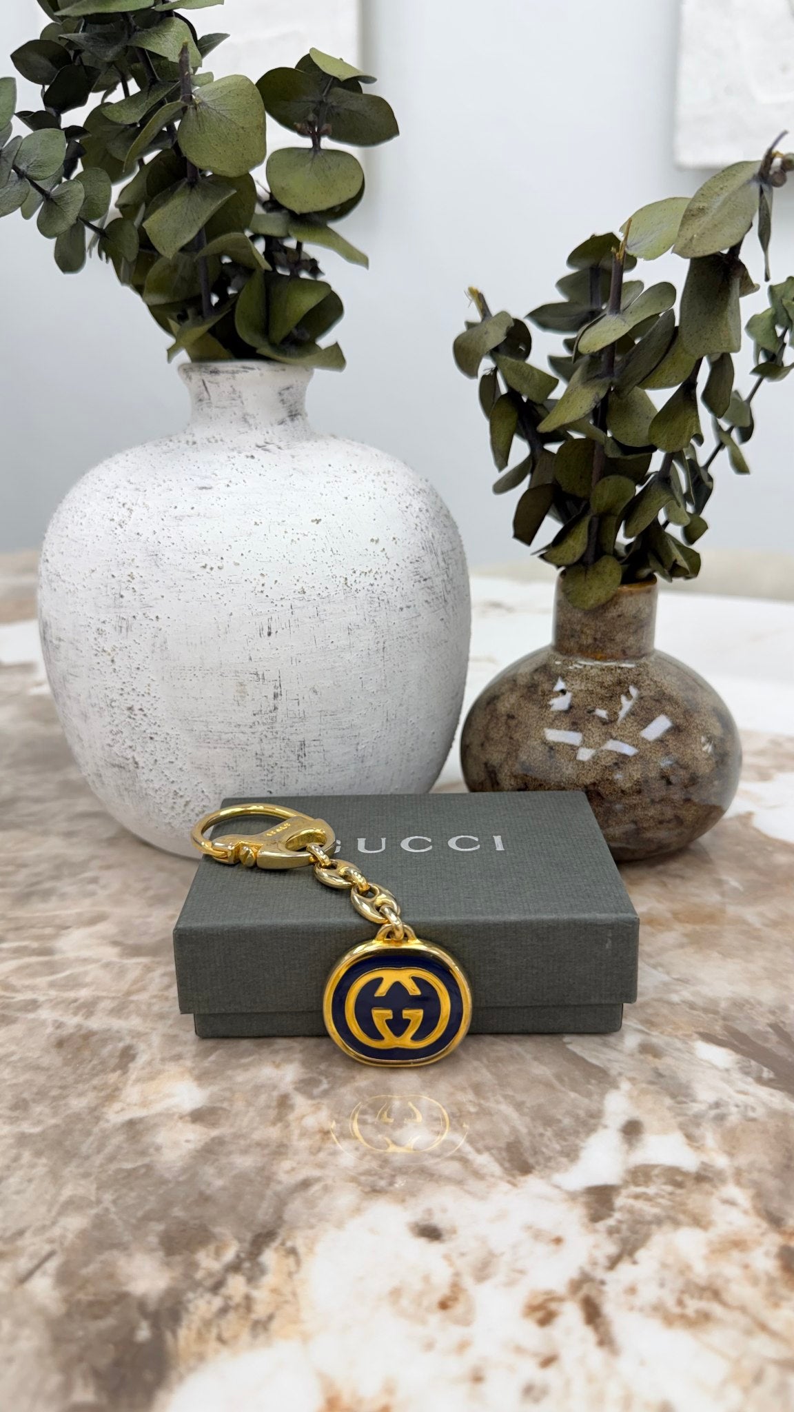 Gucci Gold Tone Enamel Interlocking G KeyChain 