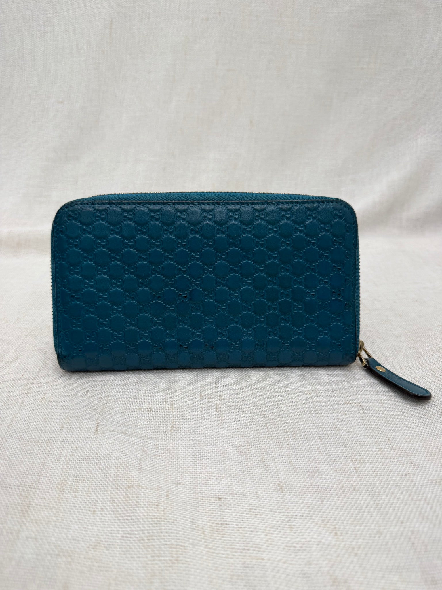 Gucci Teal Guccissima Leather Zippy Leather