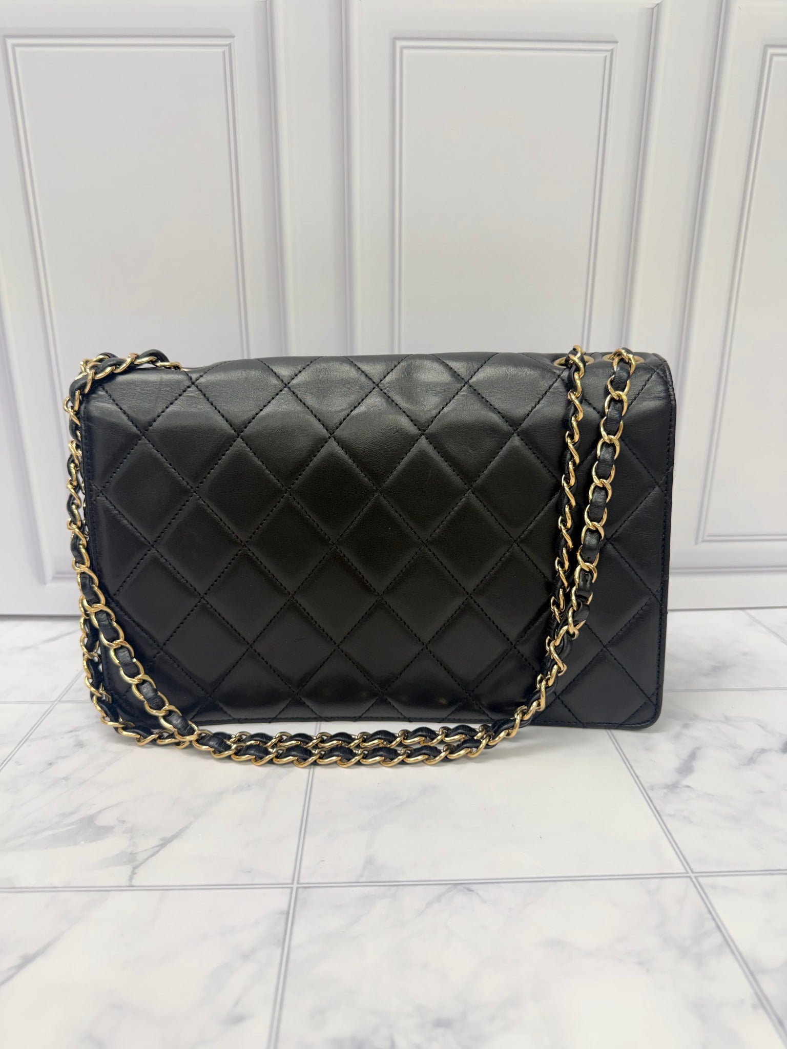 Chanel Black Lambskin Leather golden Class Flap Bag 