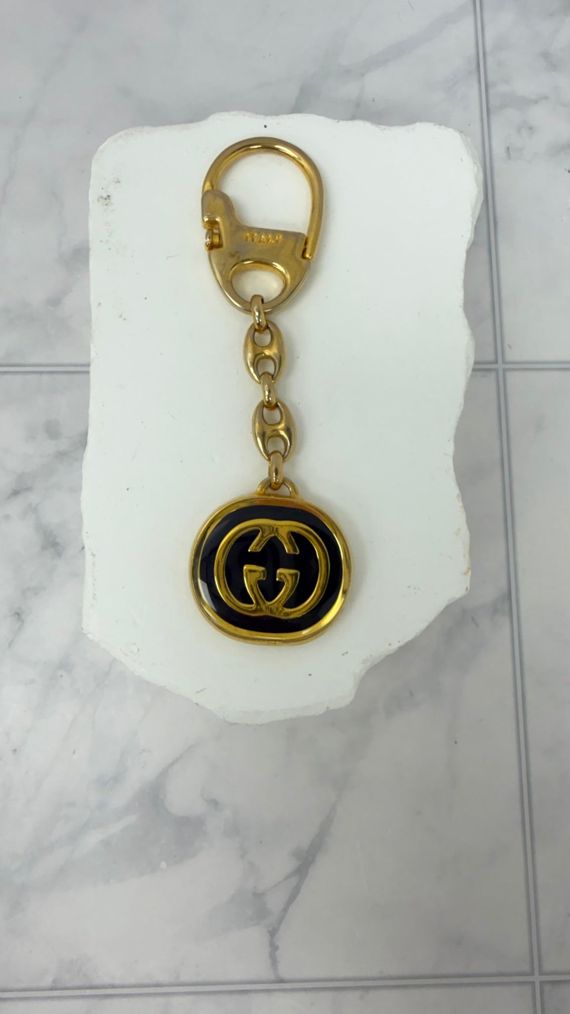 Gucci Gold Tone Enamel Interlocking G KeyChain 