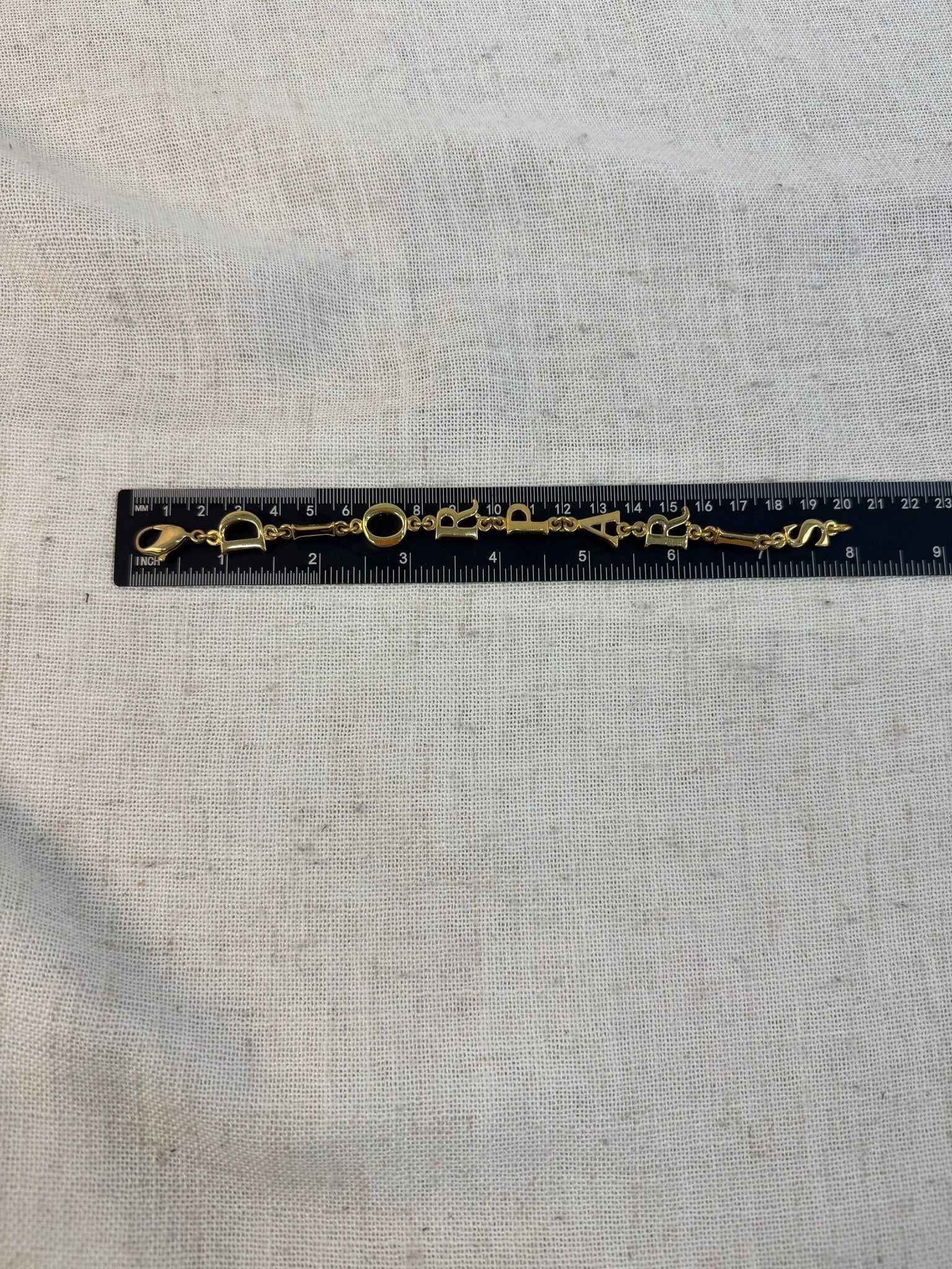 Christian Dior Gold Tone Pairs Link Letter Bracelet