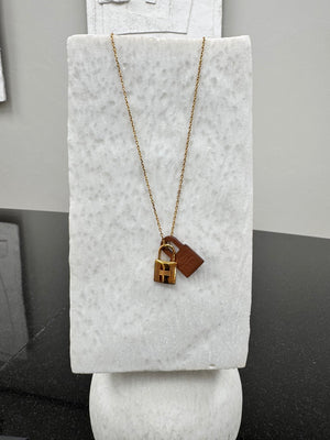 Hermes Gold And Leather Swift O'Kelly Pendant Necklace