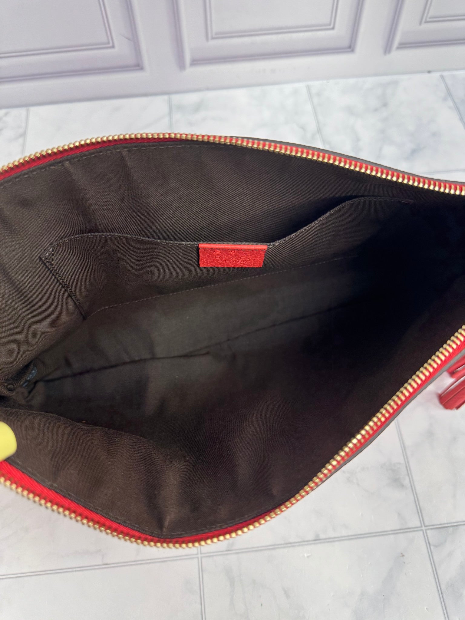 Gucci Red Pebbled Leather Clutch