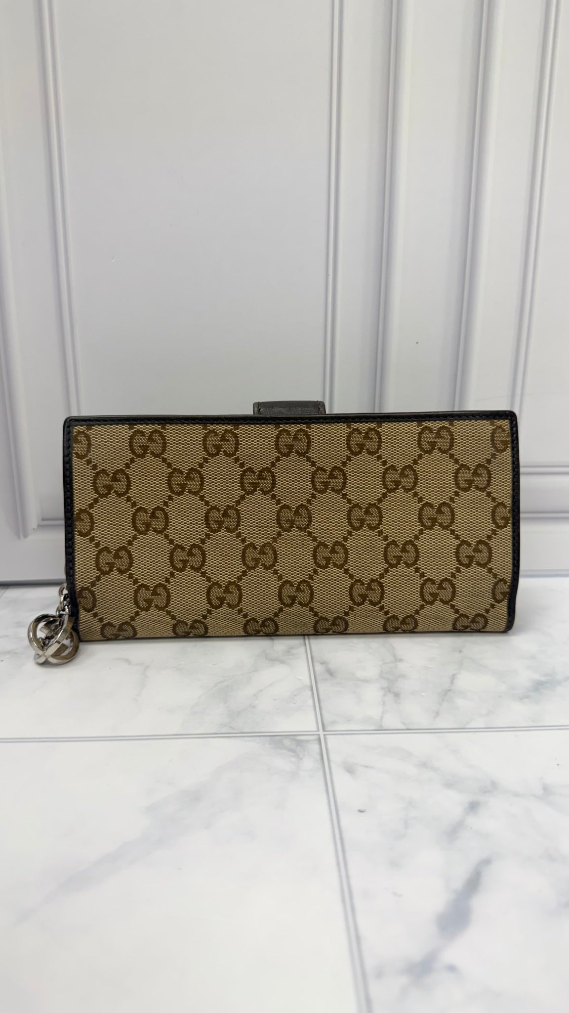 Gucci GG Supreme Canvas Zippy Wallet