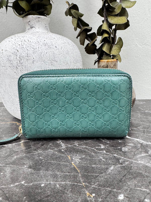Gucci Green Microguccissima Compact Zippy Wallet