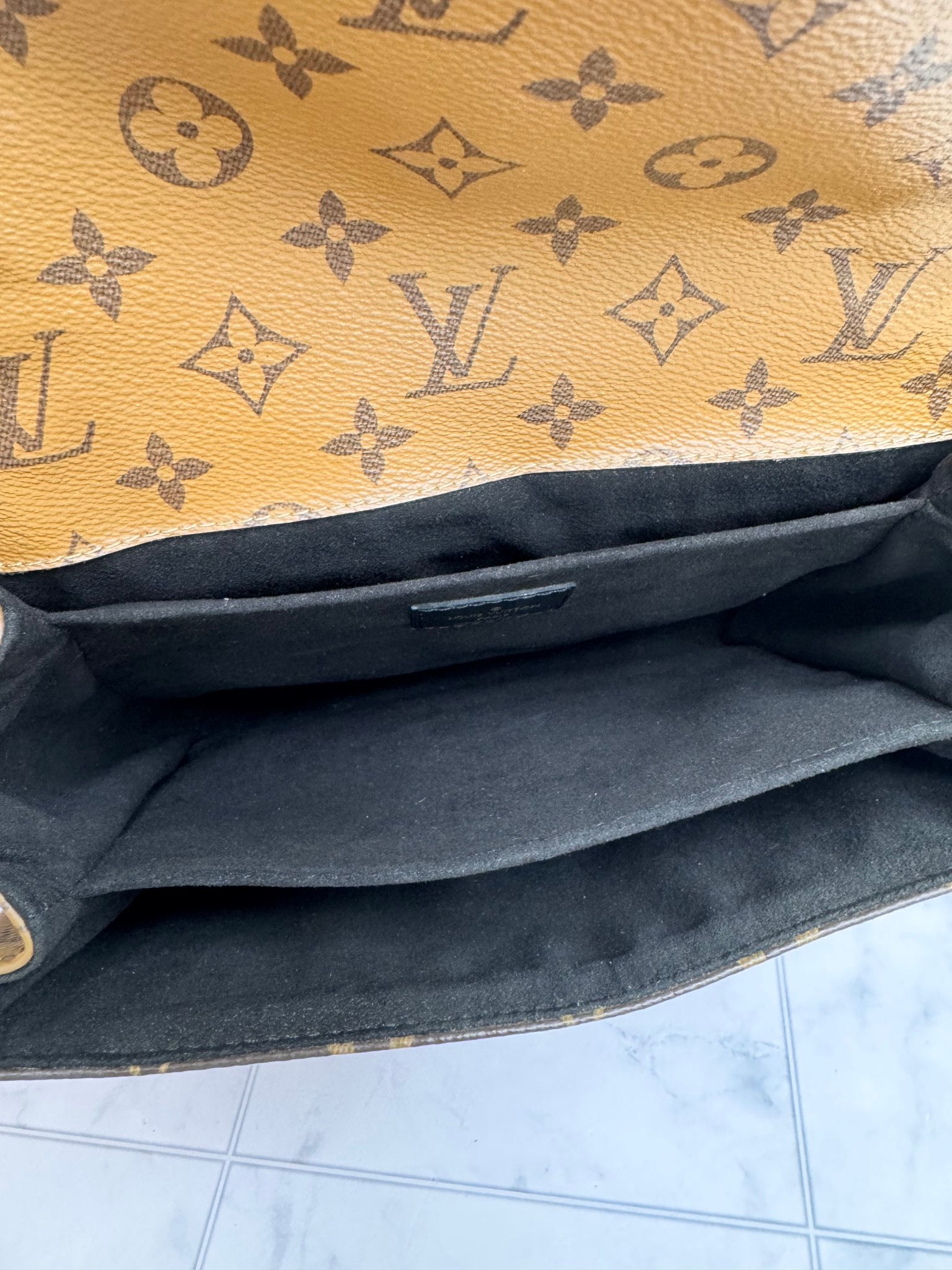 Louis Vuitton Reverse Monogram Pochette Metise