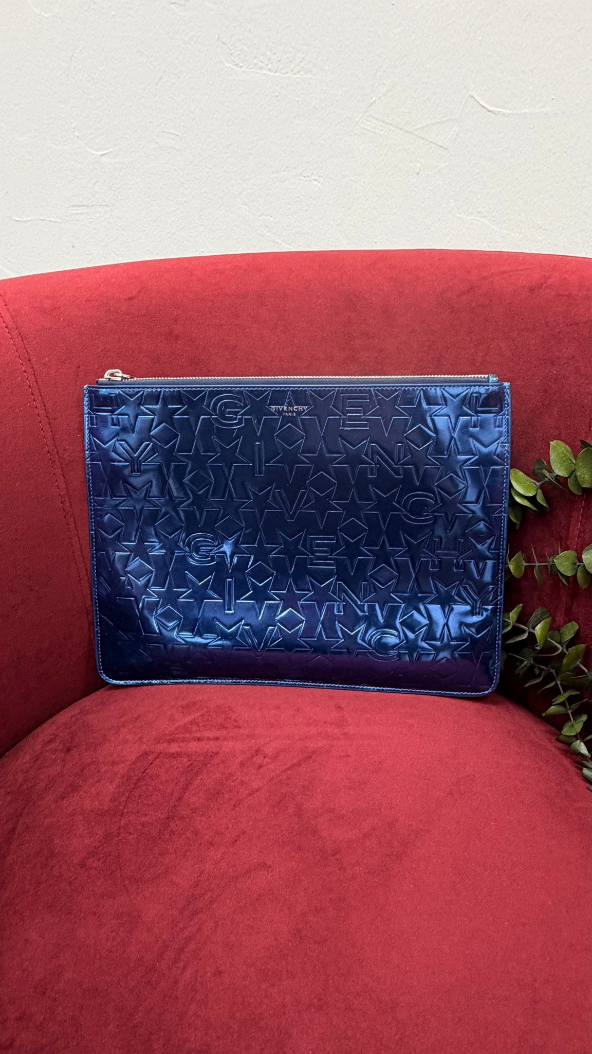 Givenchy Blue Star Embossed Zipper Clutch