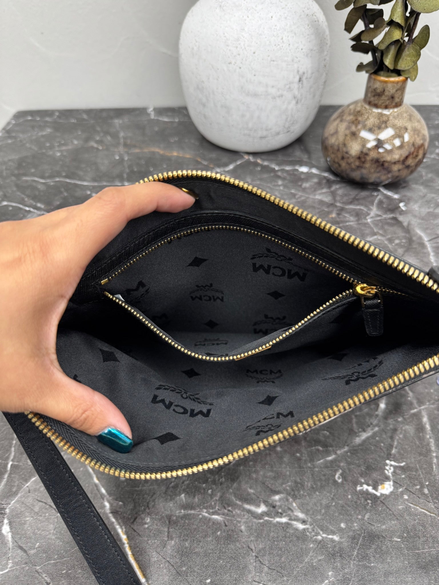 MCM Black Studded Snakeskin Clutch