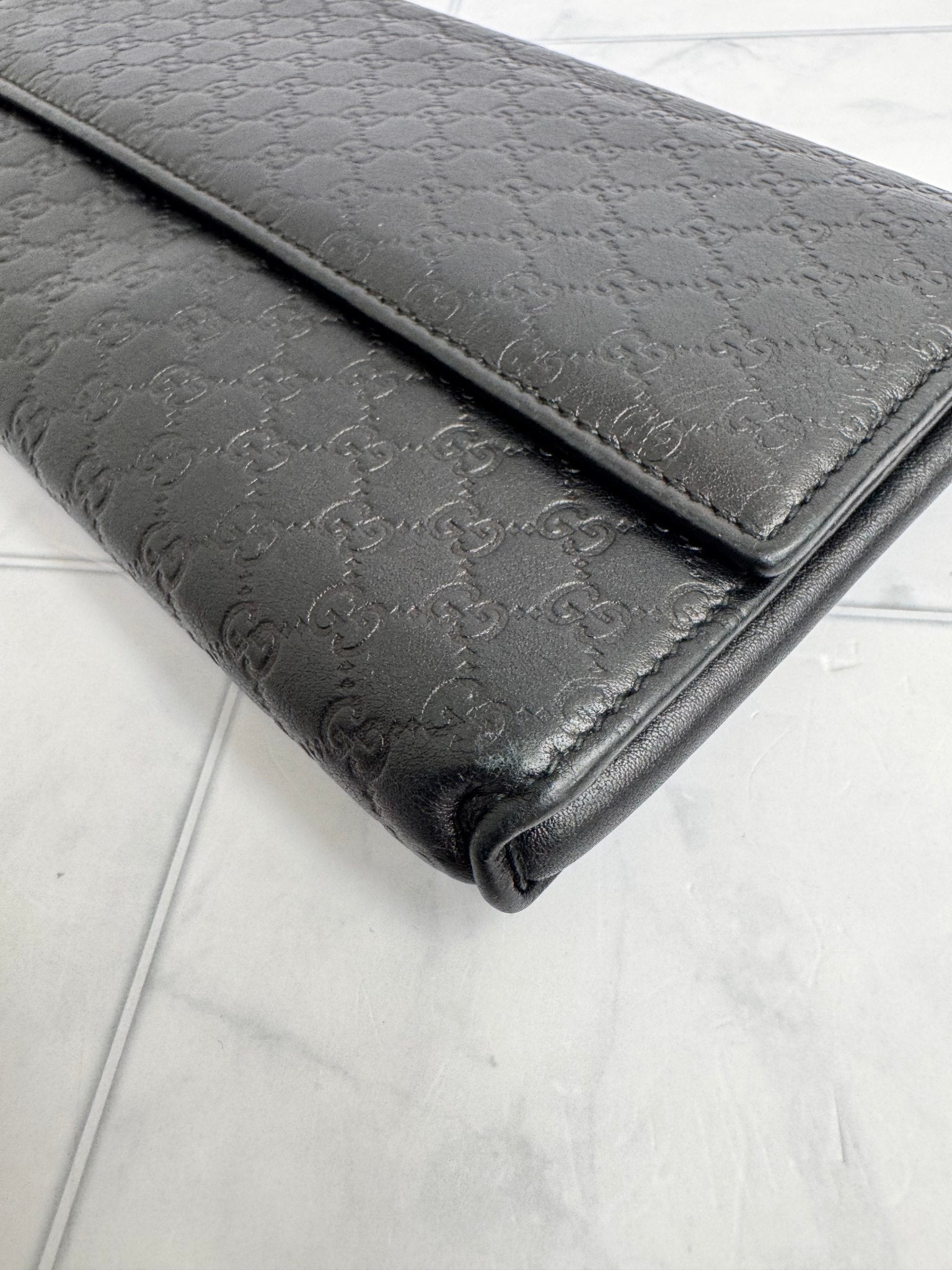 Gucci Black Microguccissima Embossed Leather Wristlet