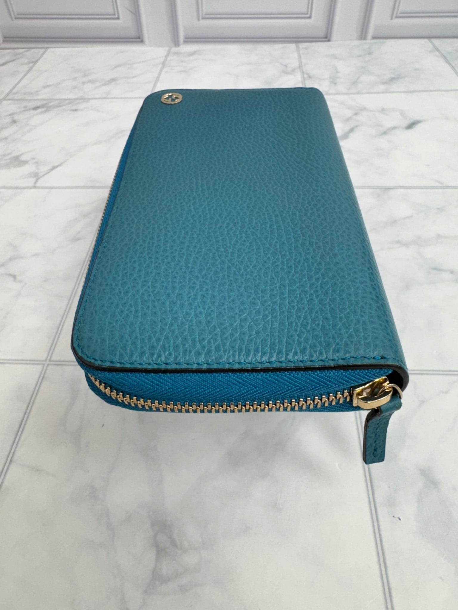 Gucci Teal Grained Leather Zippy Wallet