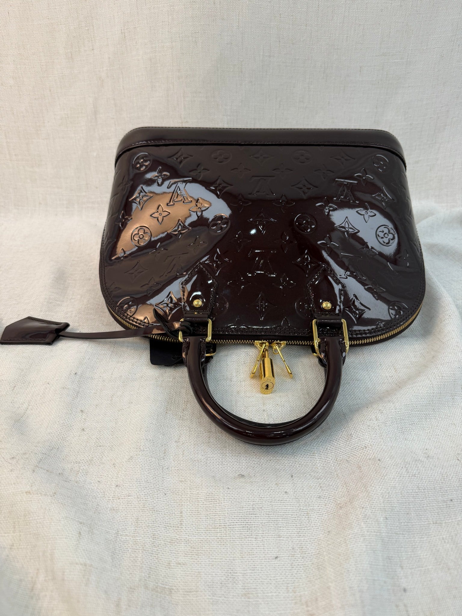 Louis Vuitton Amarante Vernis Leather Alma PM Bag