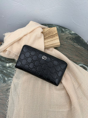 Gucci Black GG Leather Zippy Wallet